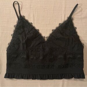 Black cami top with scalloped lace details